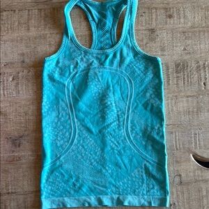 Lululemon Turquoise Racerback Aligned Tank Top
Size 4